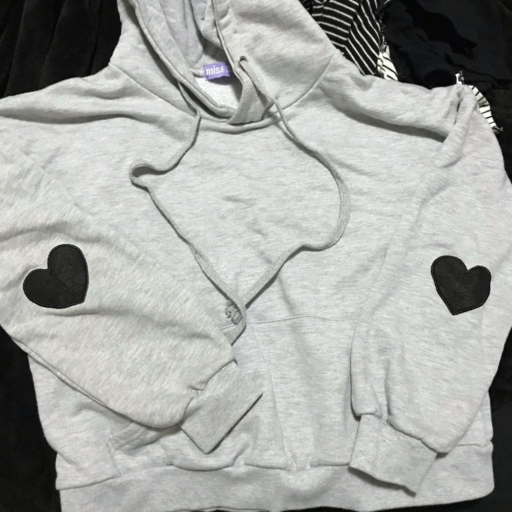 Great sweatshirt w/ black hearts on the elbows